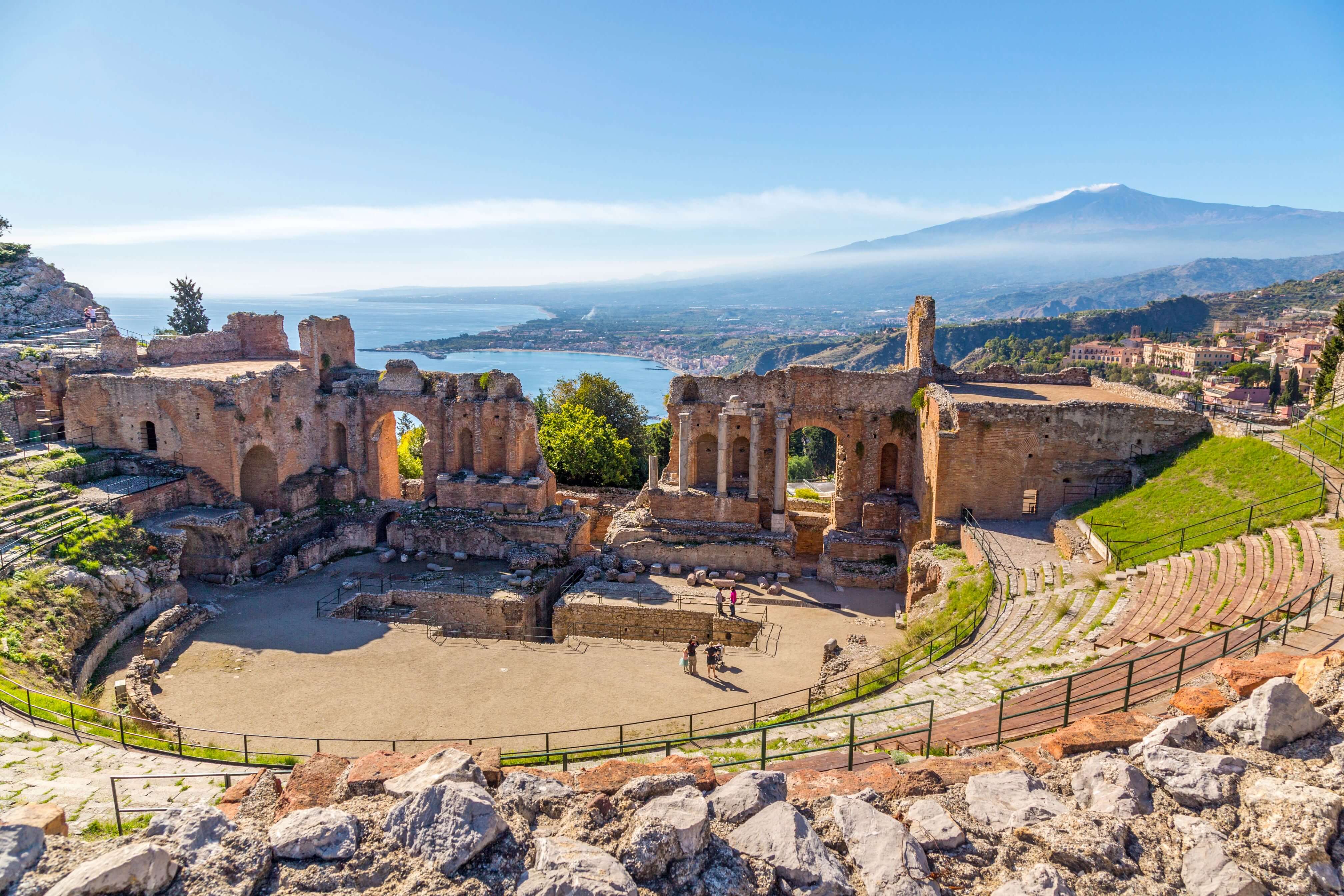 View of Taormina with Theatre of Taormina and Mount Etna, Sicily, Italy 