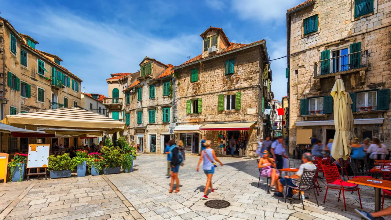 A square with restaurants and shops in Split's Old Town, Croatia