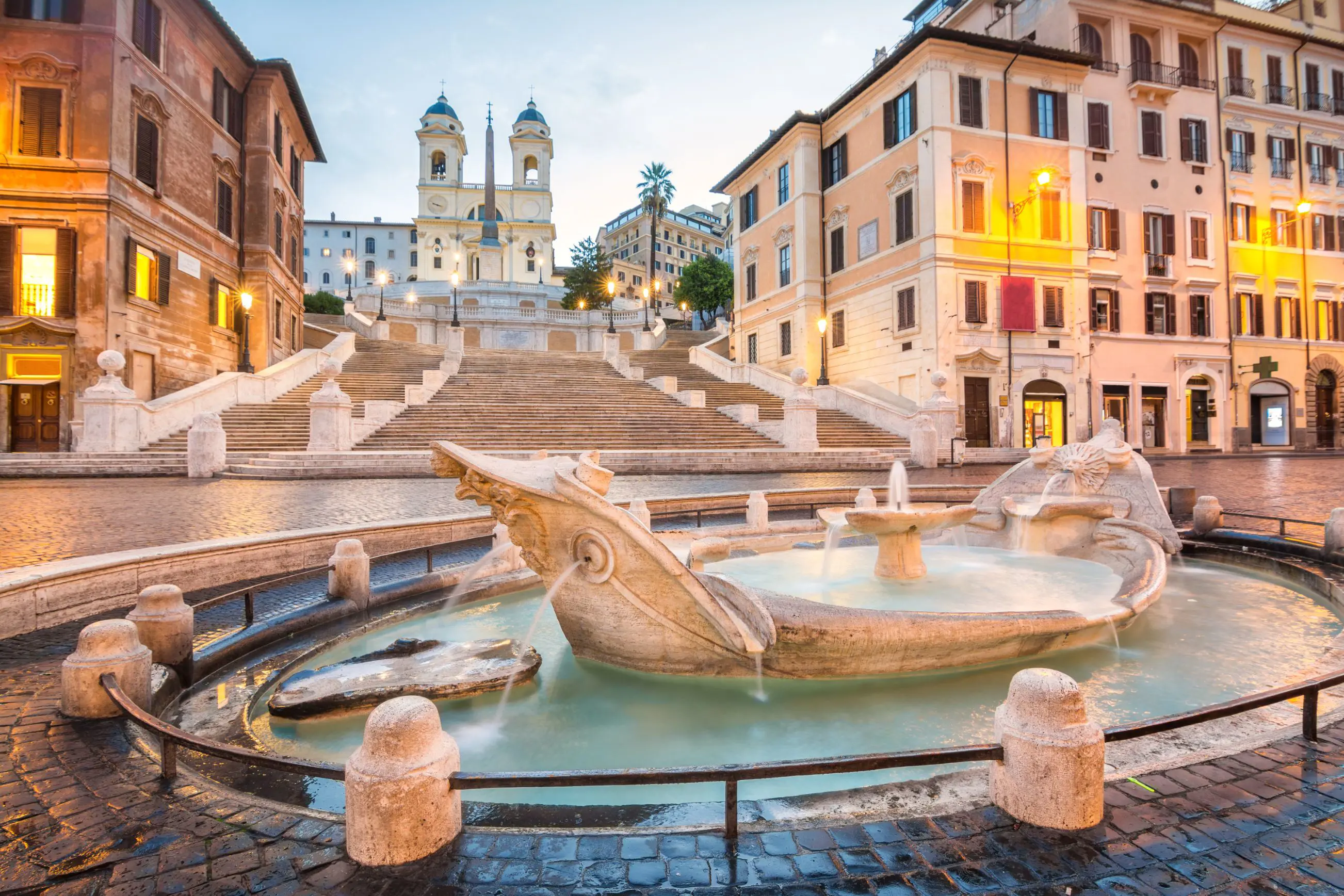 Shot of the Spanish Steps, with  Fontana della Barcaccia in the forefront 