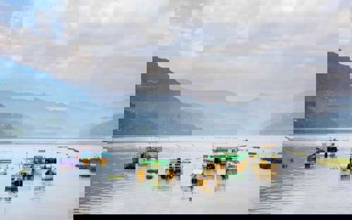 Enjoy a cruise on Lake Phewa