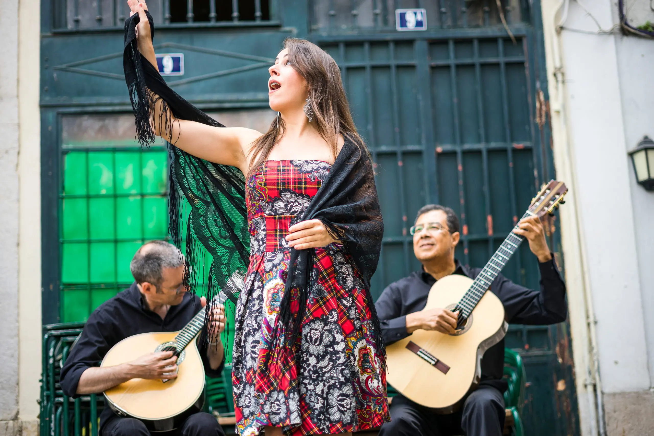 Fado Band Performing Traditional Portuguese Music On The Square Of Alfama, Lisbon, Portugal