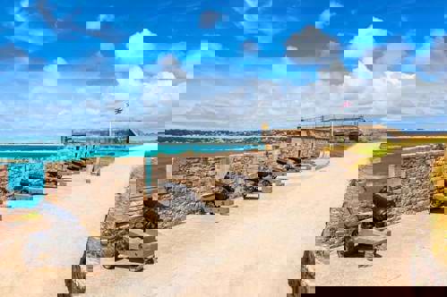 The historic cannons at Elizabeth Castle off the coast of St. Helier in Jersey.